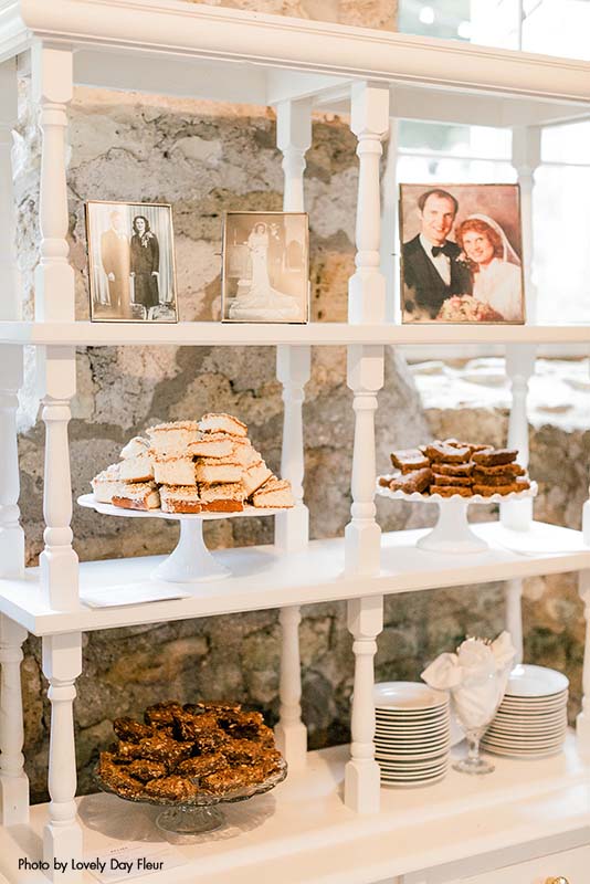 Simple layered dessert table with photo decorations
