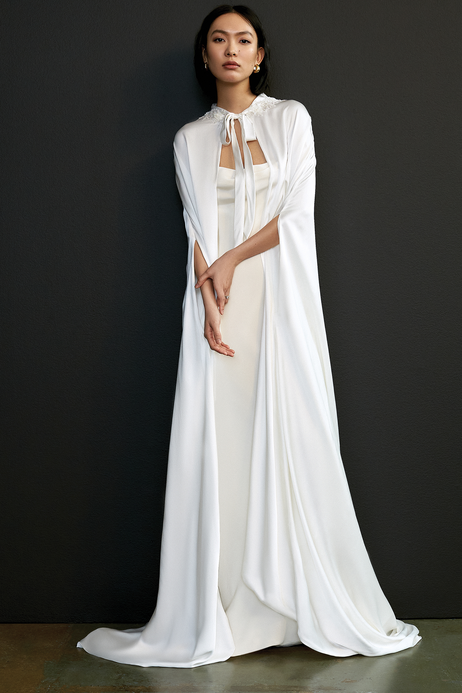 Floor-length white bridal cape