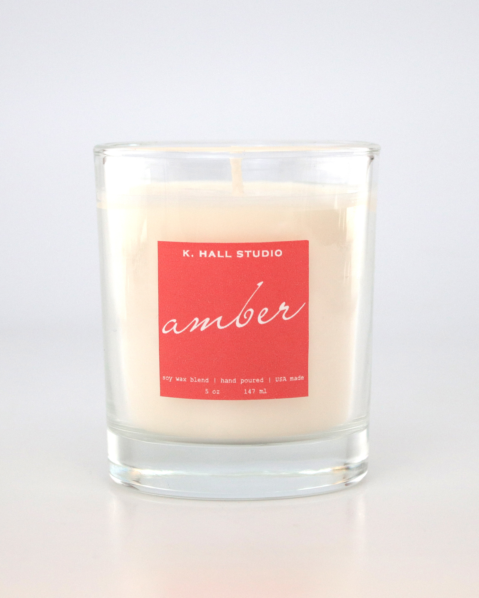 Artisan candle with pink label