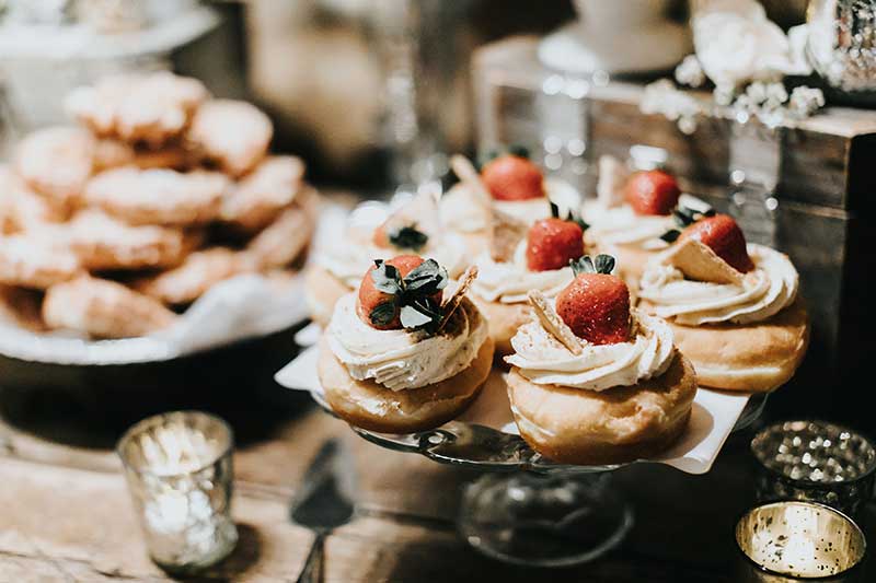 Donuts with fruit on top at wedding