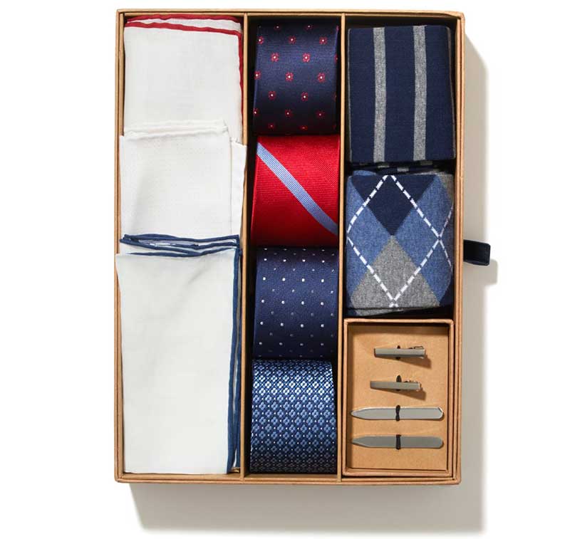 Tie box with ties, socks, tie bars