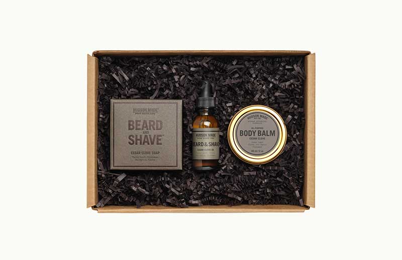 Box with beard oil, bodu balm, and soap by Barber Box