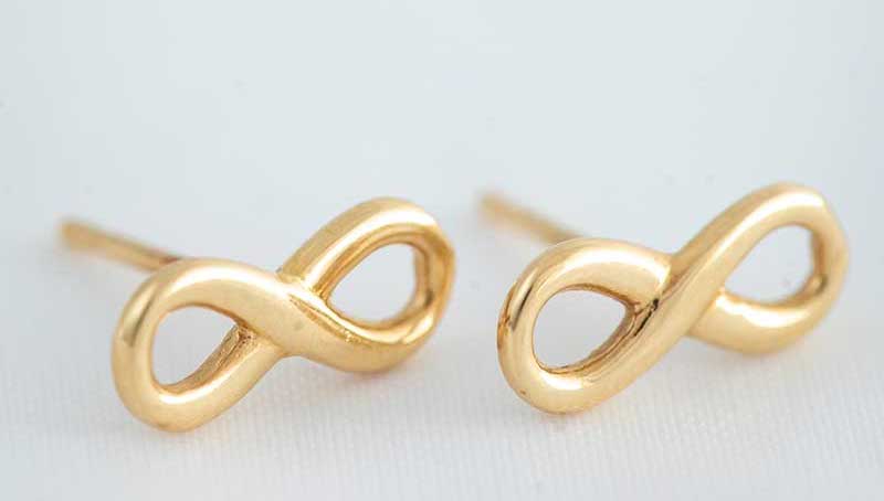 Gold infinity earrings as gifts for 
 the littles in your bridal party 