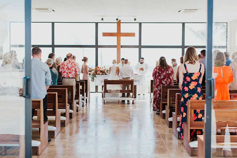 Couples marries in a church for destination wedding