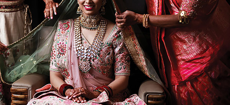 Hindu Bride with ghoonghat at cultural wedding