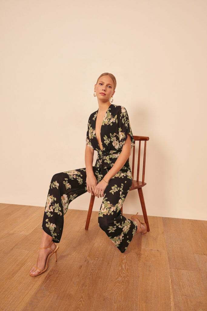 Patterned black jumpsuit for fall wedding by Reformation