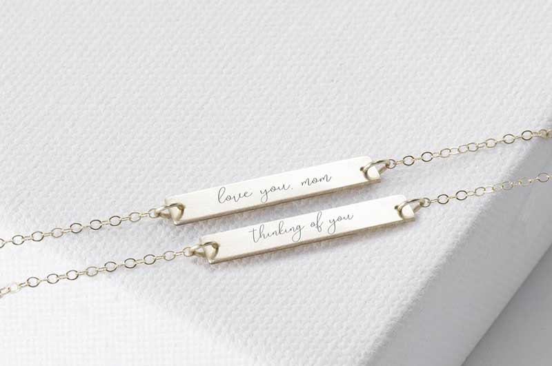 Gold bar bracelets with custom engraving by Sincerely Silver