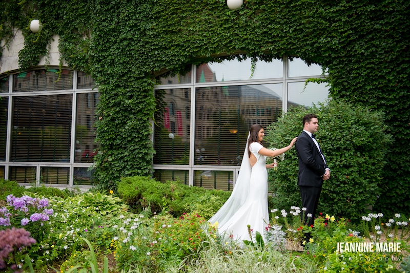 Bride and groom share first look outside of Minnesota luxury wedding venu