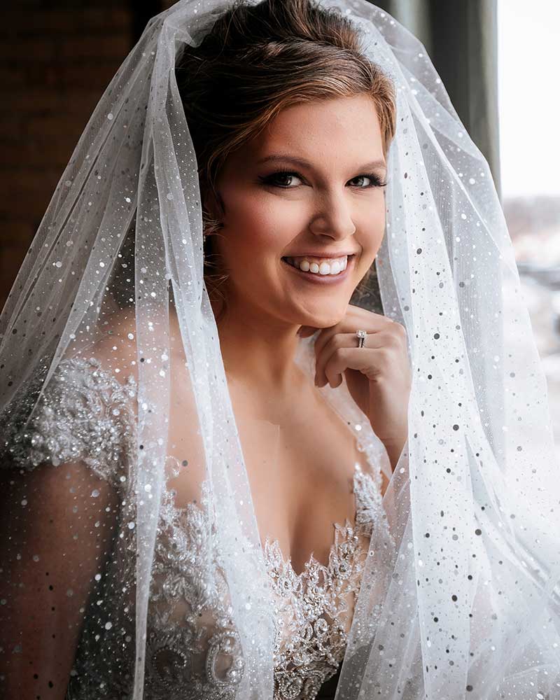 Photo of Minnesota bride with sparkly veil by Dempag Photography 