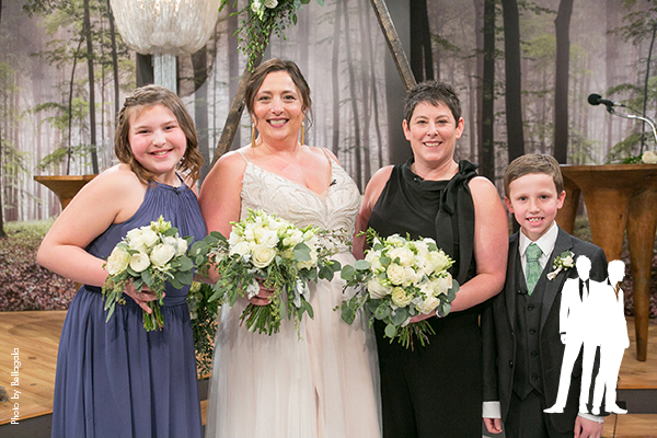 Brides with son and daughter before wedding ceremony