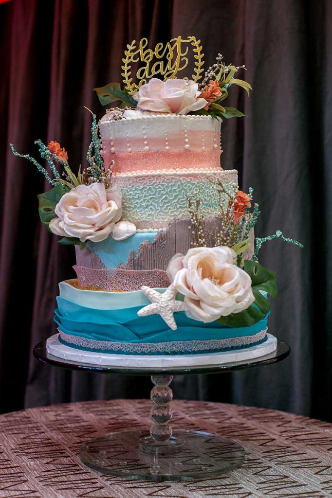 Blue and pink wedding cake at the Twin Cities Bridal Show Inspiration Station