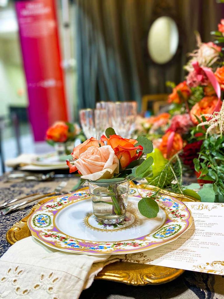 Vintage tabletop with orange and peach floral 