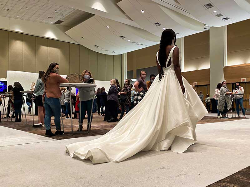 Model wears modern and sleek ballgown at the 2020 Twin Cities Bridal Show