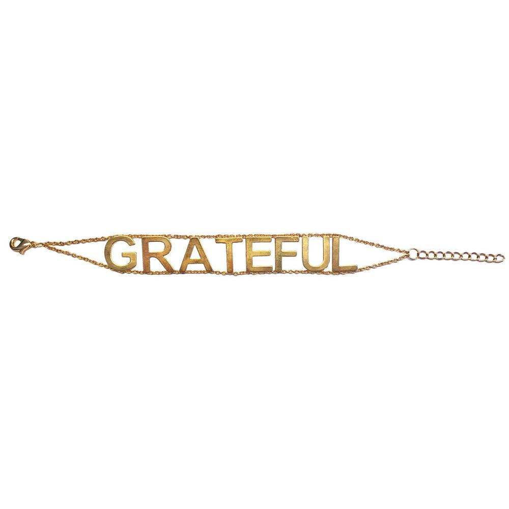 Gold necklace stating "Grateful" by Jennifer Miller Jewelry
