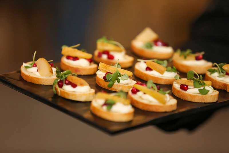Pear, brie, and cranberry bites at wedding