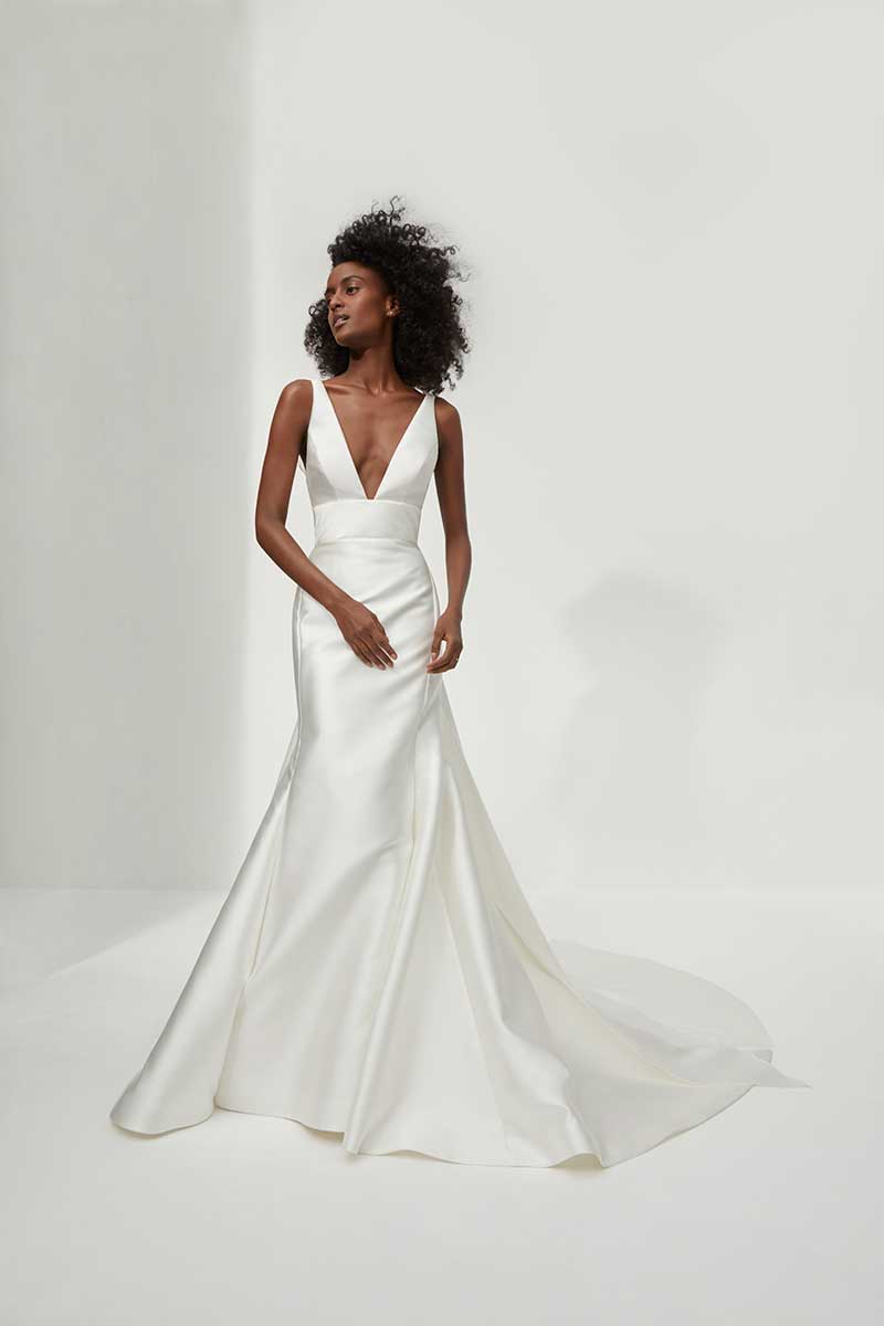 Low cut minimalist fit and flare bridal fashion gown 