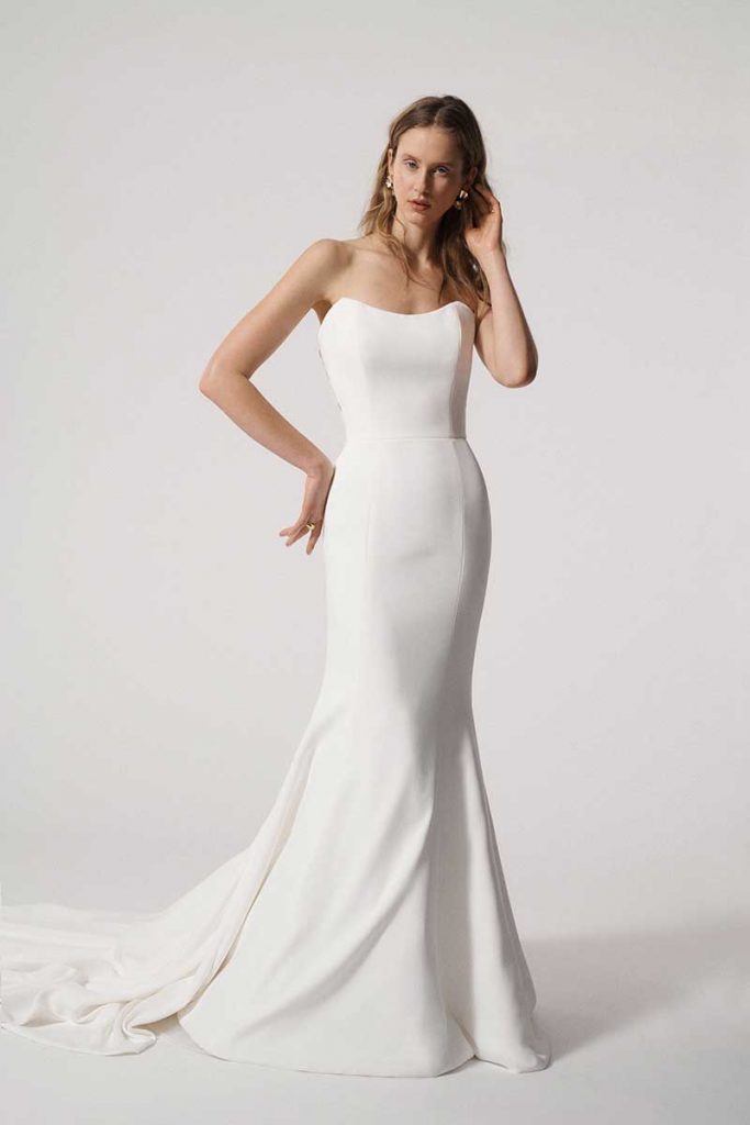 Strapless bridal gown with lace detail in back 
