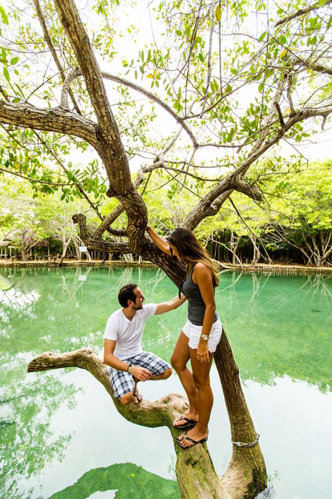 Couple explores cenote in the State of Yucatan