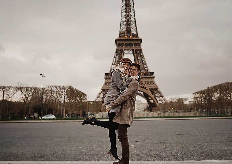 MVphotos duo Madalyn and Logan stand in front of Eifel Tower