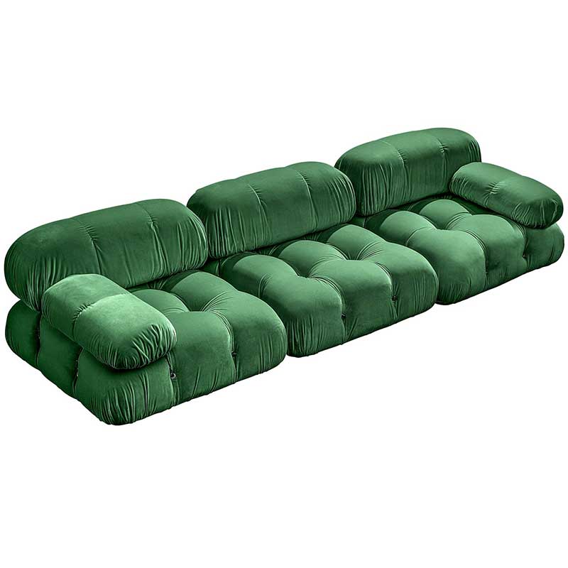 Couch with tufted green velvet