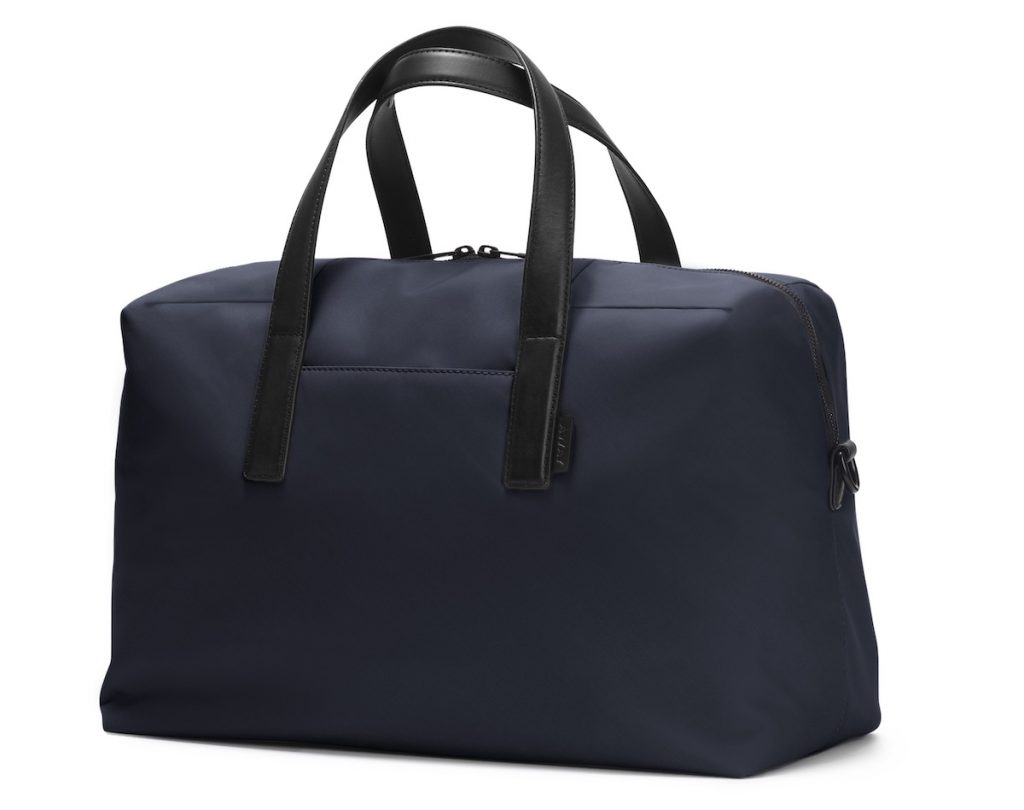 Large carry on bag in Navy by Away