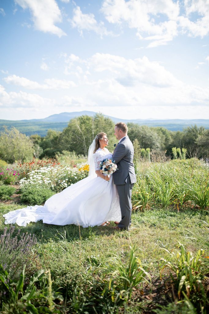 Bride and groom hold outdoor mountain wedding during a pandemic