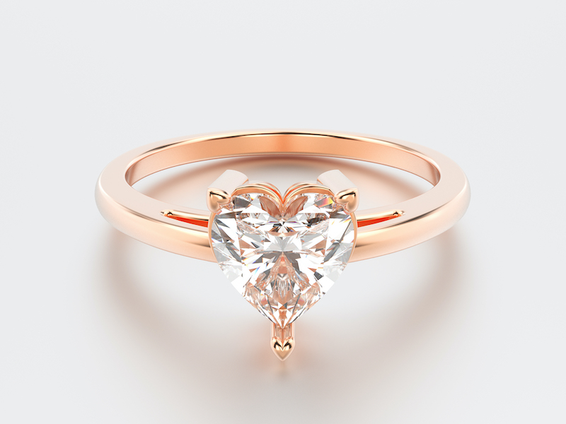 Rose gold engagement ring with heart diamond