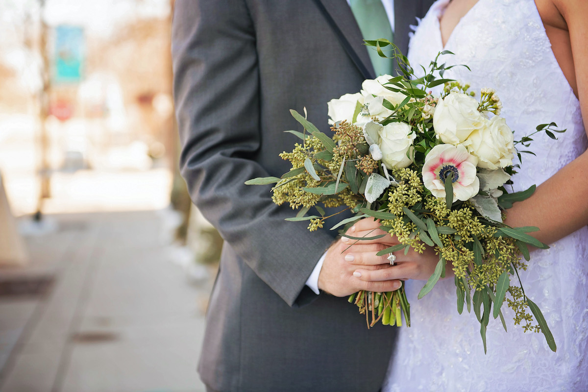 Winter wedding bouquet with roses and anenomes