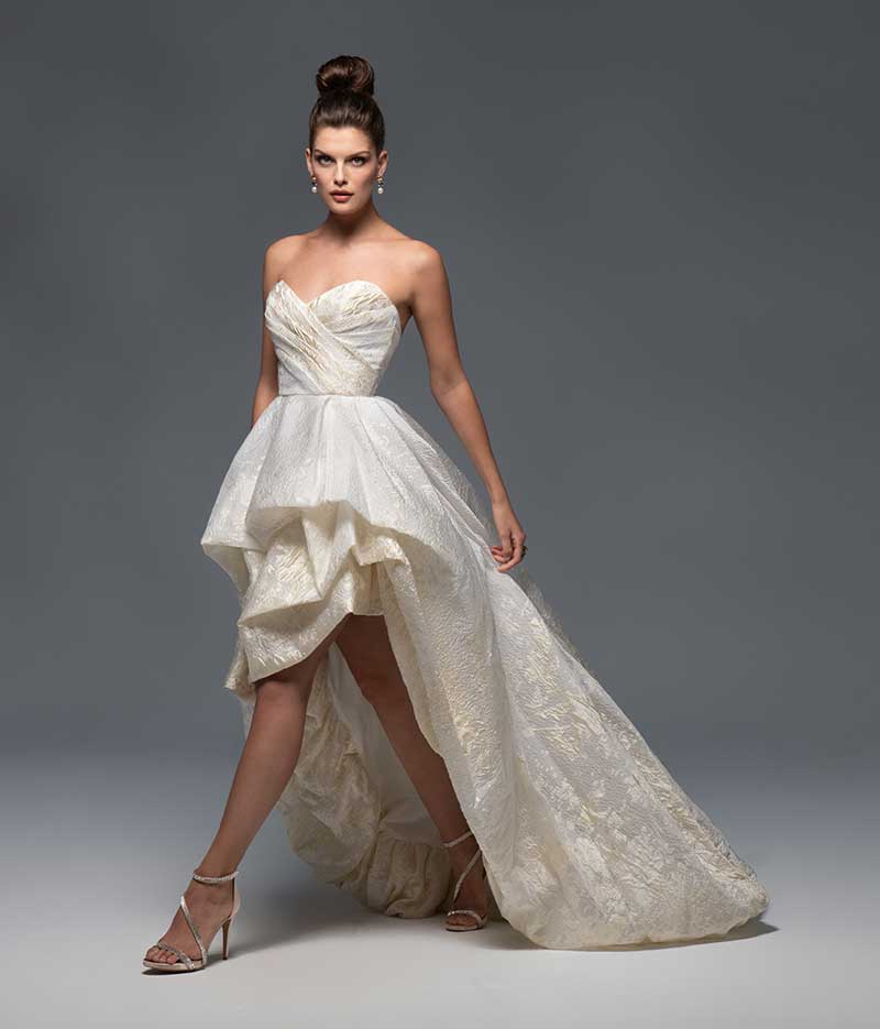 Off-white sweetheart neckline gown with high-low skirt