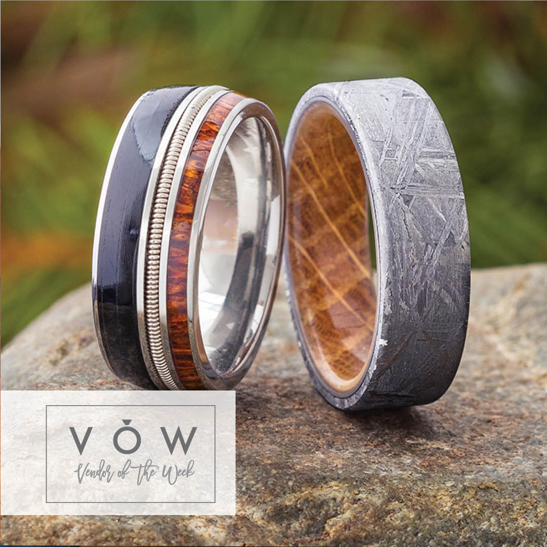 Two custom wedding bands made with wood and meteorite