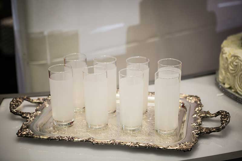 High ball frosted white glasses for wedding reception