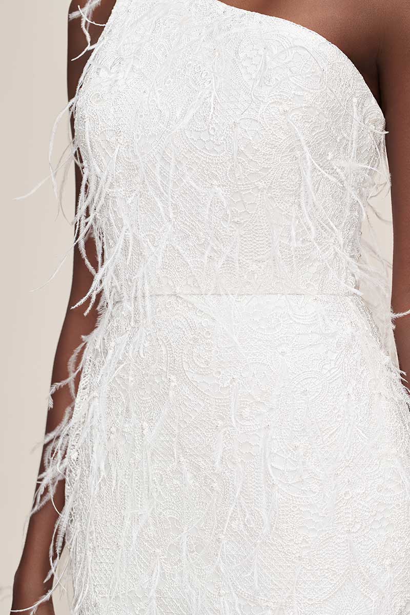 Above-the-knee, one-shoulder fringe white wedding dress