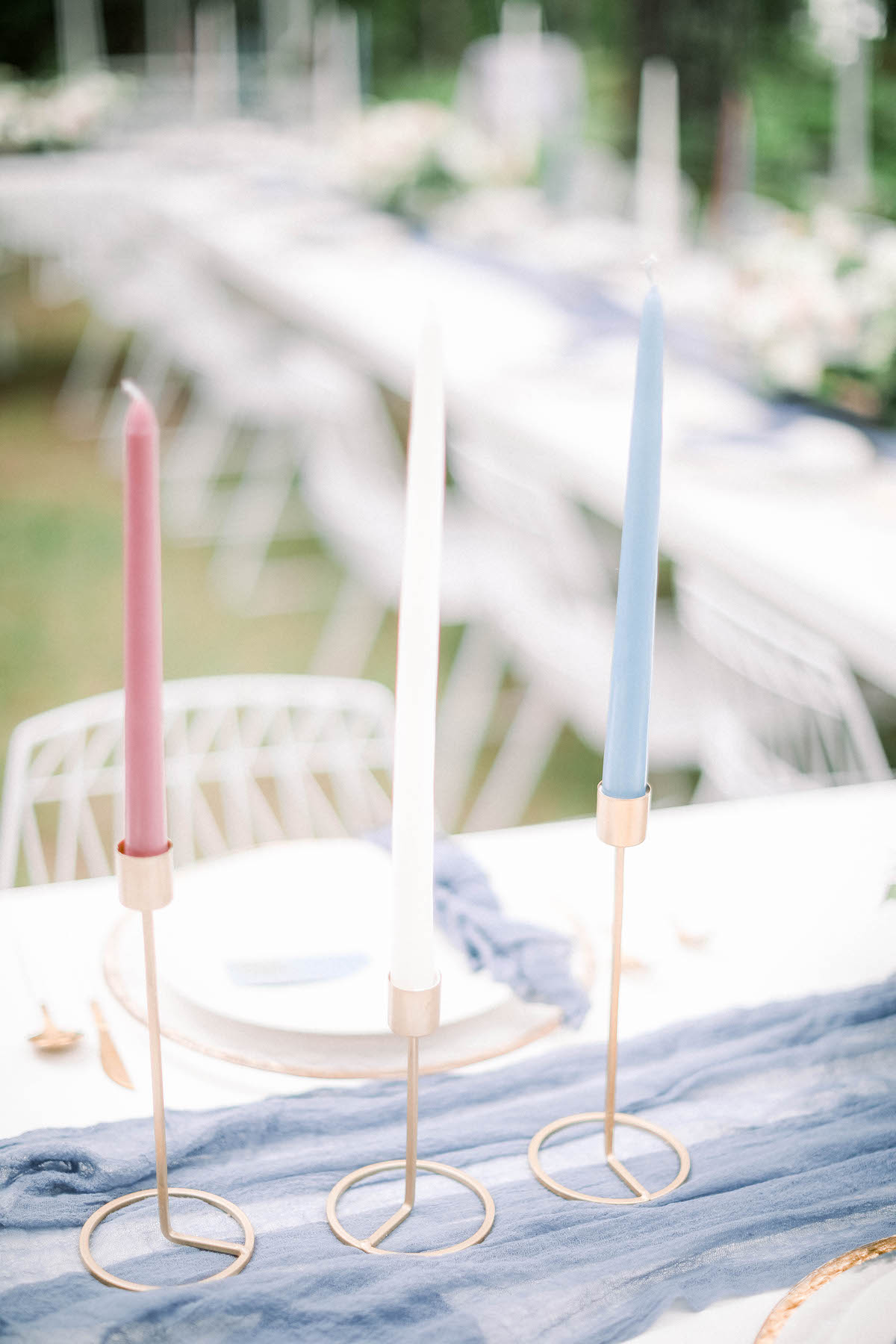 Blue, white, and red taper candle wedding decor