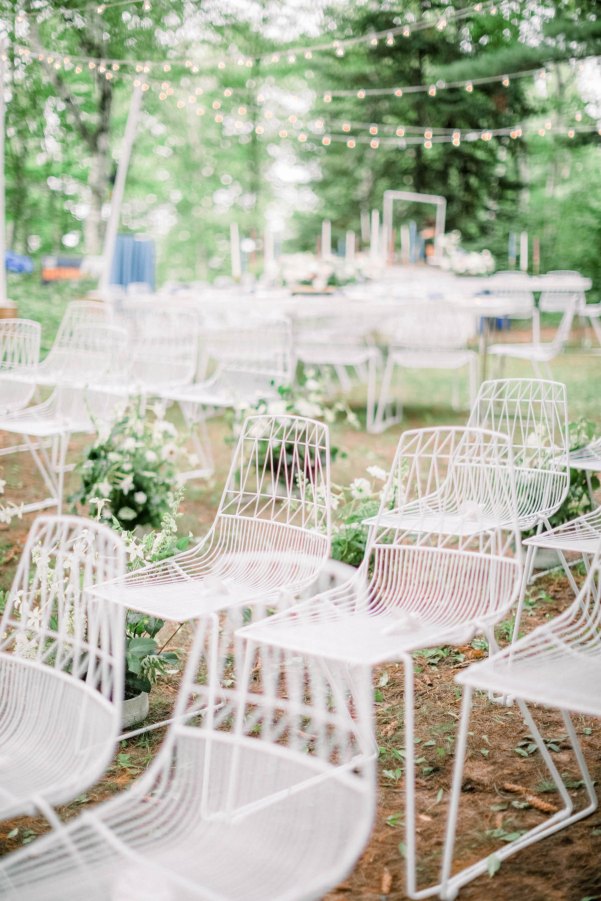 Modern white wedding chairs for outdoor wedding ceremony
