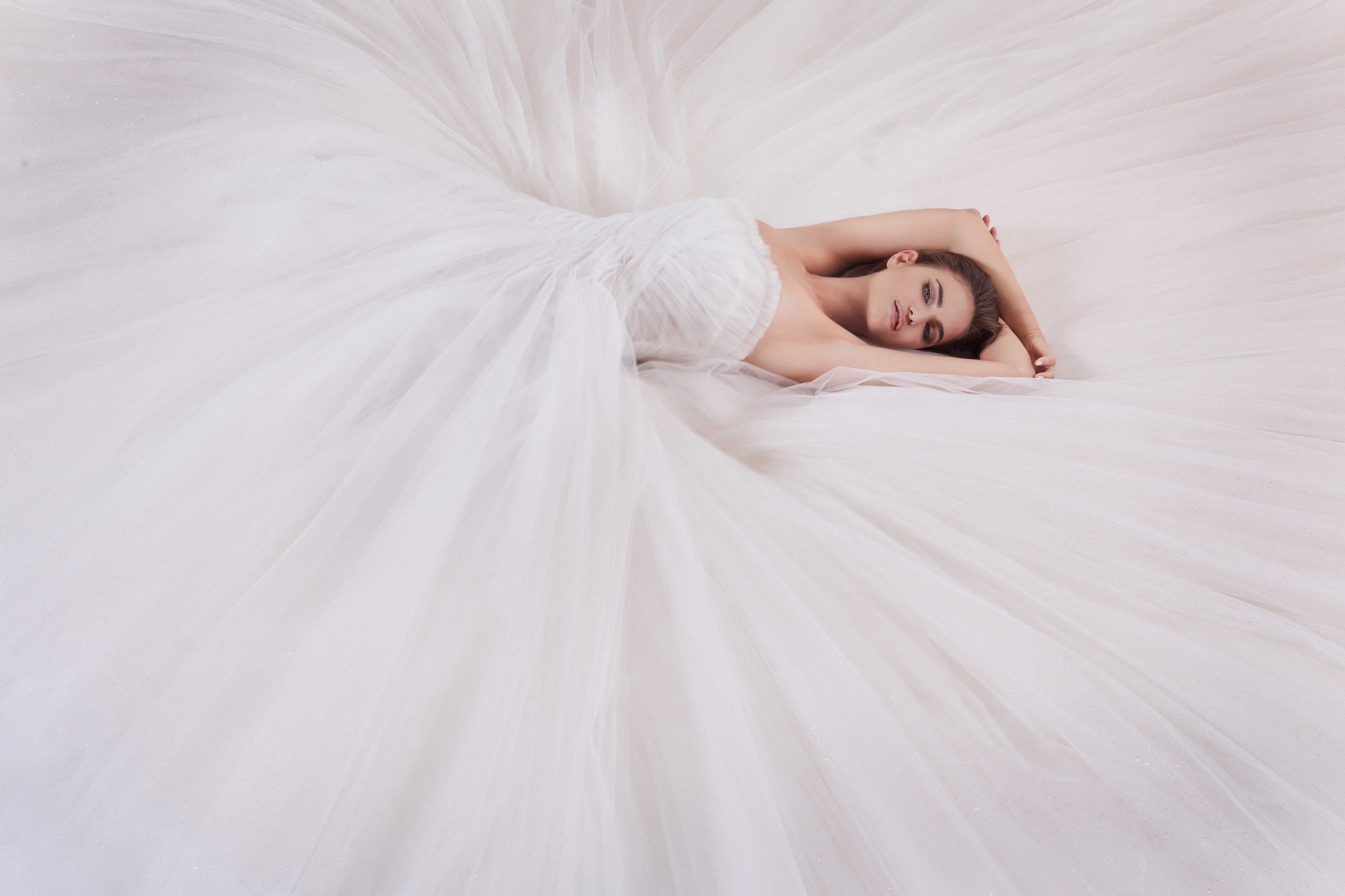 Strapless tulle blush bridal ballgown by Nicole + Felicia Couture