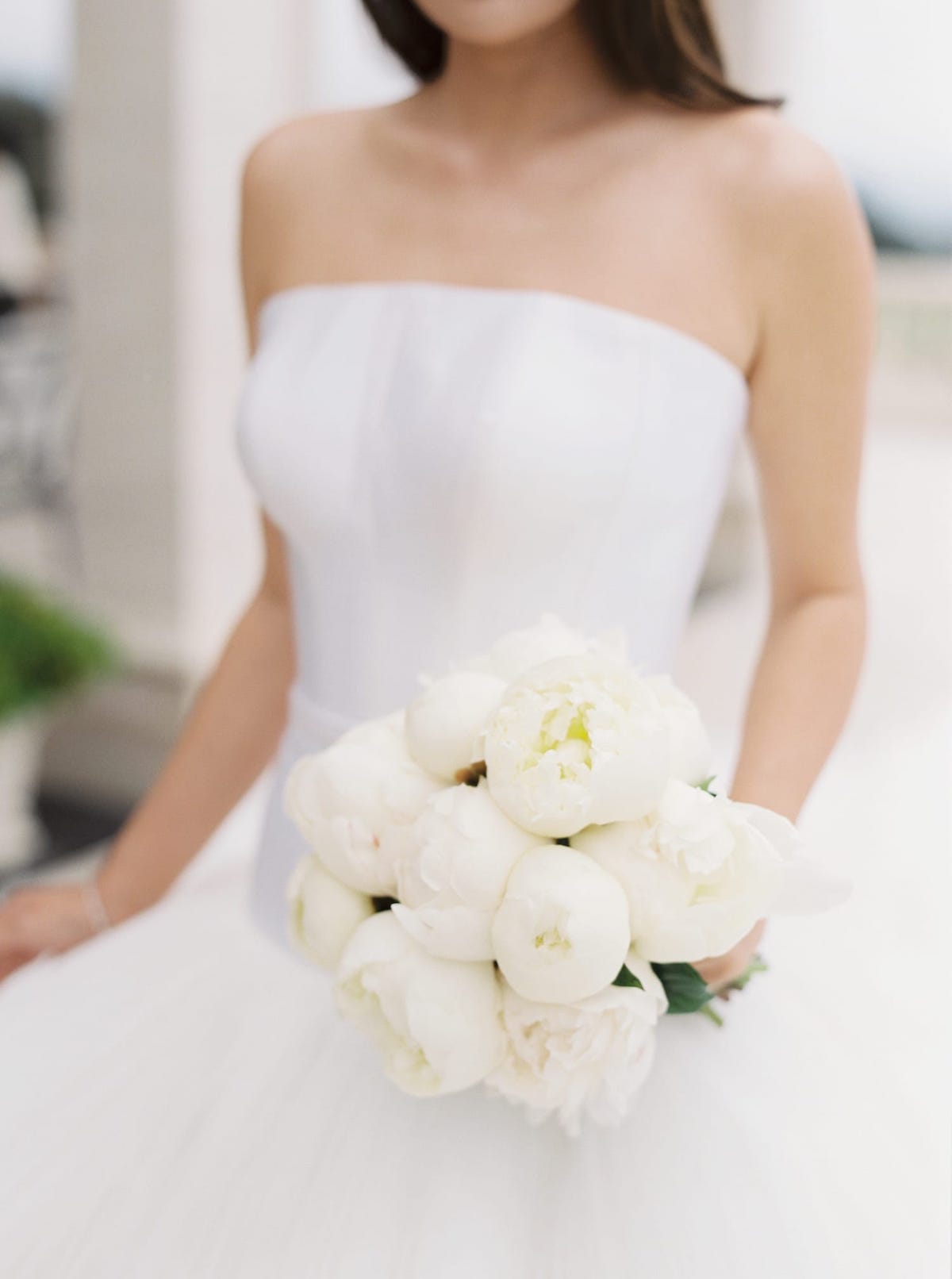 Spring bridal bouquets with all-white peonies