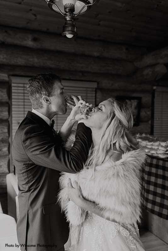 Bride and groom take whiskey shots after North Shore wedding