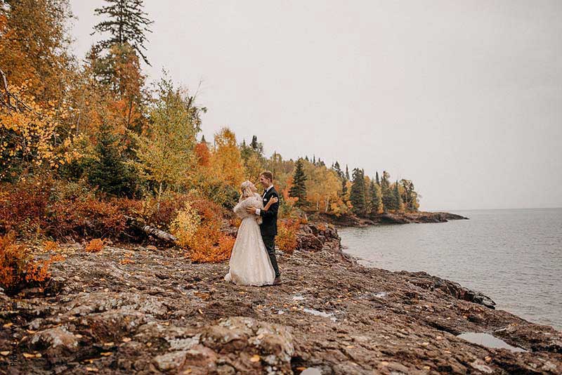 Bride and groom on the shores of Lake Superior