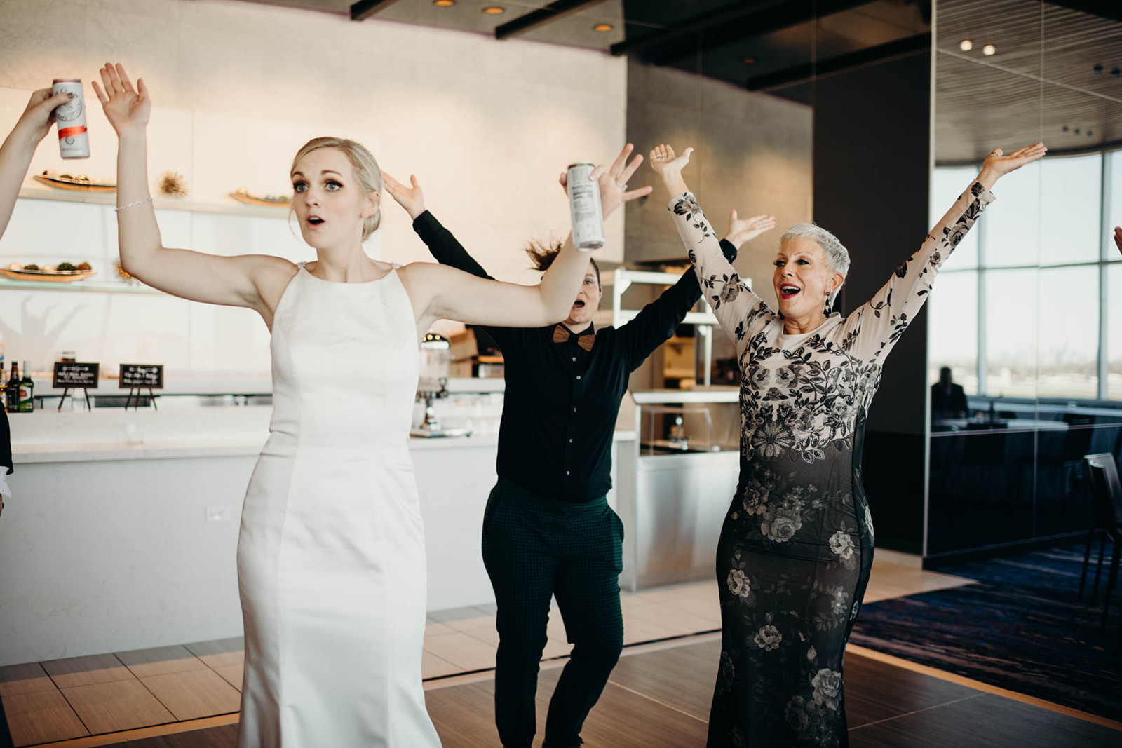 Bride dances with mother at wedding reception