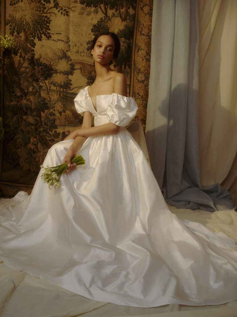 Puff-sleeve bridal gown inspired by the 80's