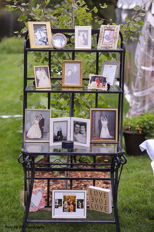 Photo station with old family wedding pictures