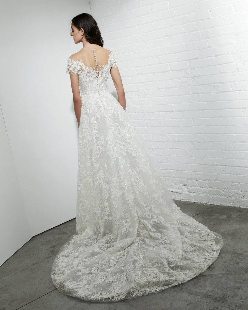 A-line gown with off-the-shoulder sleeves and illusion neckline