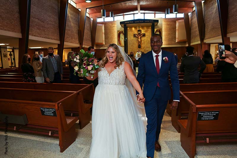Bride and groom celebrate marriage ceremony in church