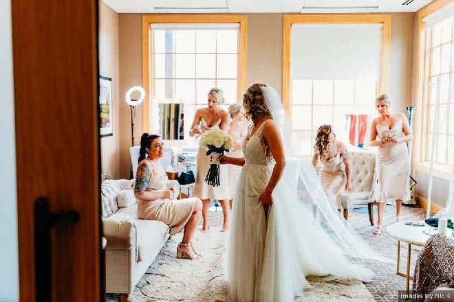 Bridal party gets ready in room furnished by Dream Day Dressing Rooms