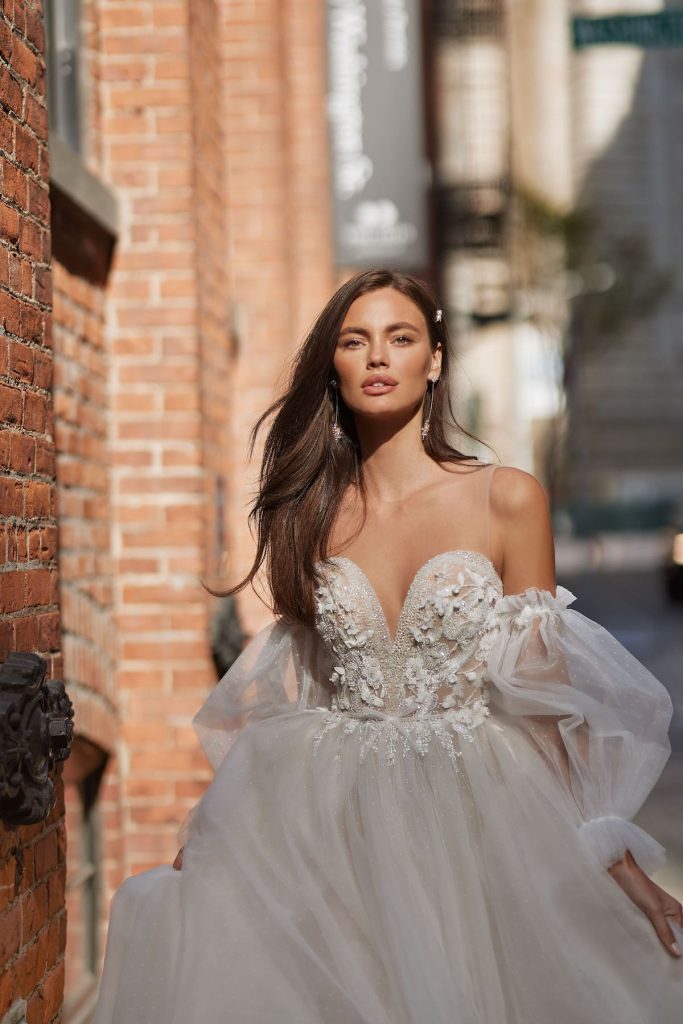A-line bridal gown with strapless corset and detachable sleeves