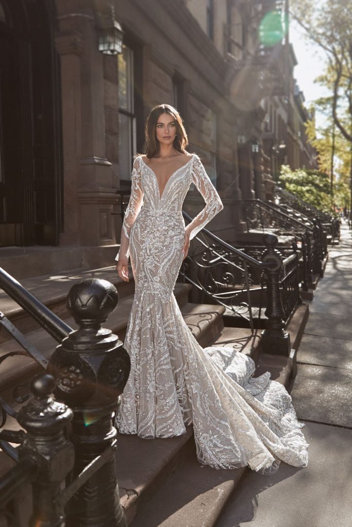 Long-sleeve bridal gown with v-neck and fit and flare body